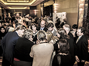Delegates huddle outside the plenary room on the last day of MOP 27